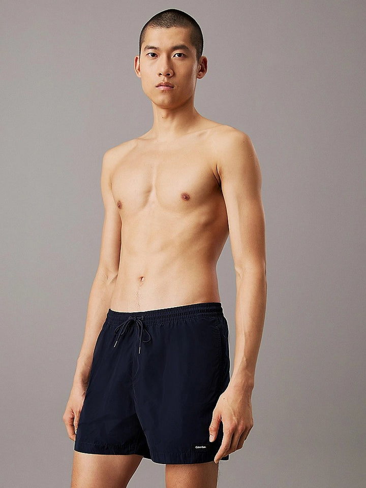 CK ESSENTIALS - MEDIUM DRAWSTRING